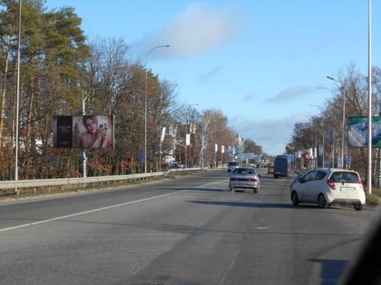 Фото рекламной плоскости по адресу м. Буча, траса М07, км 30+050 право, вул. Нове Шосе, біля ТЦ Модуль, Нова Лінія, ЕКО Маркет