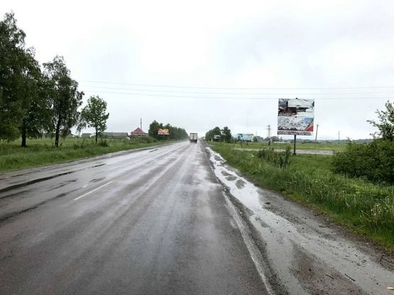 Фото рекламной плоскости по адресу Траса Н-09 Мукачево-Львів, с.Стримба 2 км. перед Надвірною, АЗС УкрПетроль, СТО, Шиномонтаж, напрямок руху на Івано-Франківськ