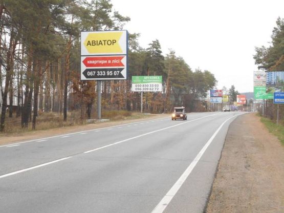 Фото рекламной плоскости по адресу м. Буча, траса М07, км 24+600 право, вул. Шевченка, заїзд до ЖК "Авіатор", виїзд з Бучі в Ірпінь, Гостомель,  перед разв'язкою Ірпінь - Гостомель- Київ
