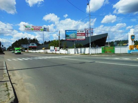 Фото рекламной плоскости по адресу м. Ірпінь , вул. Центральна,1, біля стели "Ірпінь", навпроти АЗК "ОККО"