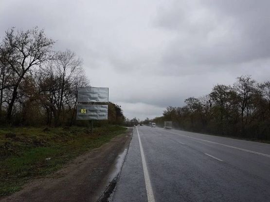 Фото рекламной плоскости по адресу Обїздна М-06, Підїзд до м.Львова,перед Дублянами АЗС Shell в сторону Київа (нижній)