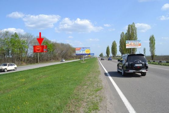 Фото рекламної площини за адресою Московский пр-т - Ростовская трасса возле газовой заправки-1 (выезд из города)