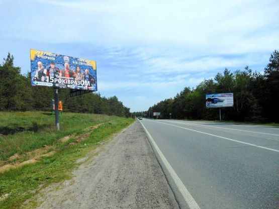 Фото рекламної площини за адресою Конча-Заспа, траса Р-02, км 34+600 право, поворот на с. Рудики, с. Плюти Фото рекламної площини за адресою Конча-Заспа, траса Р-02, км 34+600 право, поворот на с. Рудики, с. Плюти