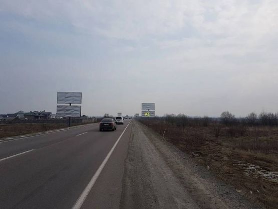 Фото рекламной плоскости по адресу Об'їзна М-10, З.О. м. Львова, Панська Гора в сторону ТРЦ King Cross Leopolis (нижній)1