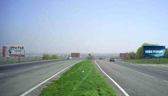 Фото рекламной плоскости по адресу р-н оптового овощного рынка и на въезде в г. Славянск (направление на Славянск)