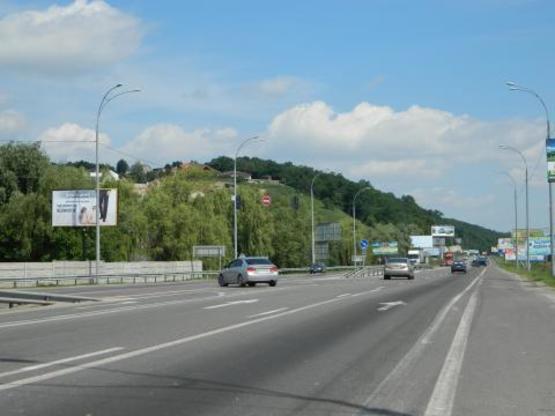 Фото рекламної площини за адресою Новообуховская трасса 20+780 справа в Киев