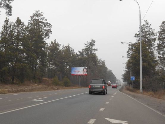 Фото рекламної площини за адресою Конча-Заспа, траса Р-02, км 29+700 право, навпроти супермаркету "FAVORE", АЗС "БРСМ"
