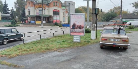 Фото рекламной плоскости по адресу ул. Первомайская, возле д. № 63/16 возле ЖД вокзала в сторону центрального рынка Фото рекламной плоскости по адресу ул. Первомайская, возле д. № 63/16 возле ЖД вокзала в сторону центрального рынка