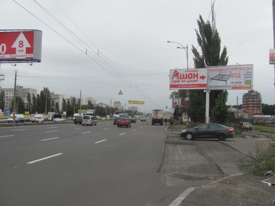 Фото рекламної площини за адресою Кольцевая дорога - поворот к ТЦ "АШАН" (магазин "Технополис", в направлении Софиевской Борщаговки)
