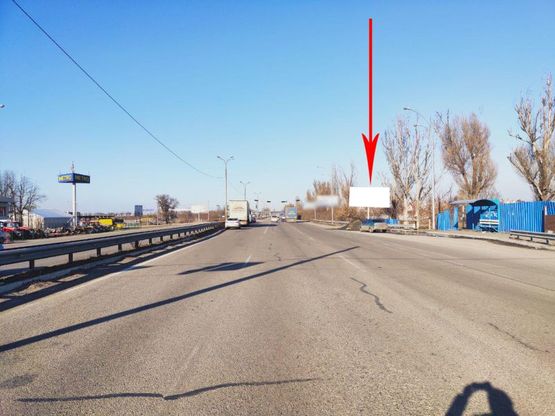 Фото рекламної площини за адресою s302А,просп. Слобожанський (Газ. Правда), поворот на Метро, через дорогу, виїзд з міста на Підгородне), біля світлофора