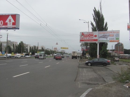 Фото рекламної площини за адресою Кольцевая дорога - поворот к ТЦ "АШАН" (магазин "Технополис", в направлении Софиевской Борщаговки)