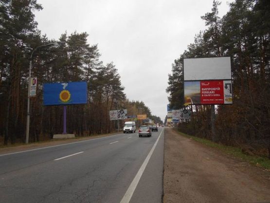 Фото рекламной плоскости по адресу м. Буча, траса М07, км 25+650 право, вул. Шевченка, 250 м до АЗК "Shell", АЗК "UPG"