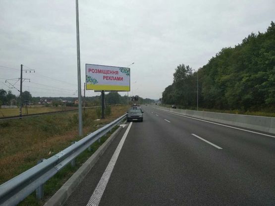 Фото рекламної площини за адресою Новообухівська траса (2 до Києва в напрямку м.Обухів)