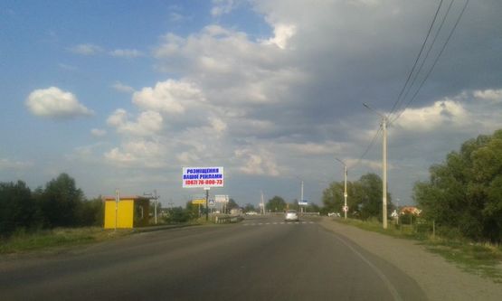 Фото рекламної площини за адресою Трасса Р-69, за автобусной остановкой с. Осещина, слева