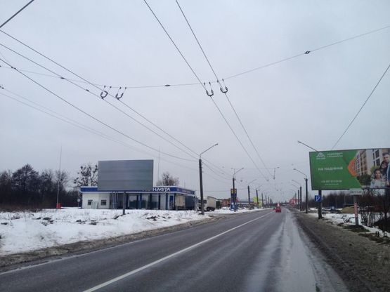 Фото рекламной плоскости по адресу В'їзд в місто, Сихівське кладовище,Автодорога  Н-09  Мукачево-Рахів-Богородчани-Івано-Франківськ-Рогатин-Бібрка-Львів, км 437+770 ліворуч