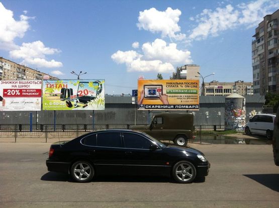 Фото рекламной плоскости по адресу Ул Кирова 50                                 (Кировский Рынок)5 Фото рекламной плоскости по адресу Ул Кирова 50                                 (Кировский Рынок)5