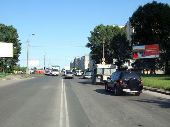 Фото рекламной плоскости по адресу перехрестя Старокостянтинівське шосе - вул.Прибузька (висотка). неподалік: автостоянка, шиномонтаж, АЗК, супермаркет "Вопак", непродовольчий ринок (від центру) Фото рекламной плоскости по адресу перехрестя Старокостянтинівське шосе - вул.Прибузька (висотка). неподалік: автостоянка, шиномонтаж, АЗК, супермаркет "Вопак", непродовольчий ринок (від центру)