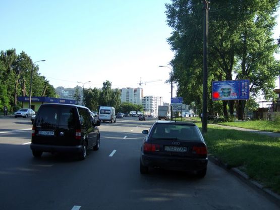 Фото рекламной плоскости по адресу Старокостянтинівське шосе (ТЦ "МійДім", ближній до круга). неподалік: меблевий ТЦ "МійДім", супермаркет "Сільпо", магазини автозапчастин, авторинок, автосалони "БМВ","Мерседес","Опель","Рено","Хюндай","Шкода" та інші. (в'їзд в місто, в центр) Фото рекламной плоскости по адресу Старокостянтинівське шосе (ТЦ "МійДім", ближній до круга). неподалік: меблевий ТЦ "МійДім", супермаркет "Сільпо", магазини автозапчастин, авторинок, автосалони "БМВ","Мерседес","Опель","Рено","Хюндай","Шкода" та інші. (в'їзд в місто, в центр)