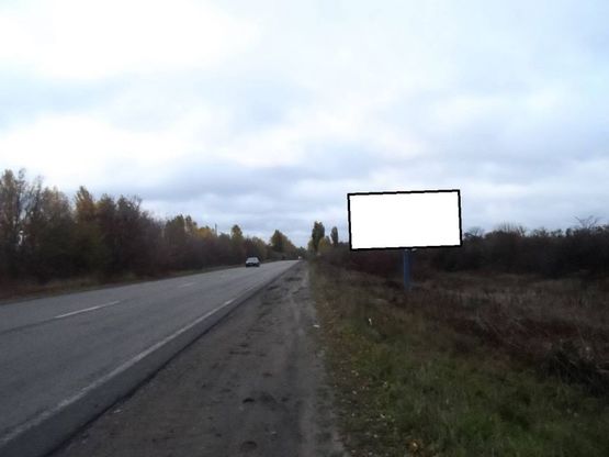 Фото рекламной плоскости по адресу г.Фастов,  Кольцевая дорога, 500 м до клумбы ул.Якубовского, на Киев