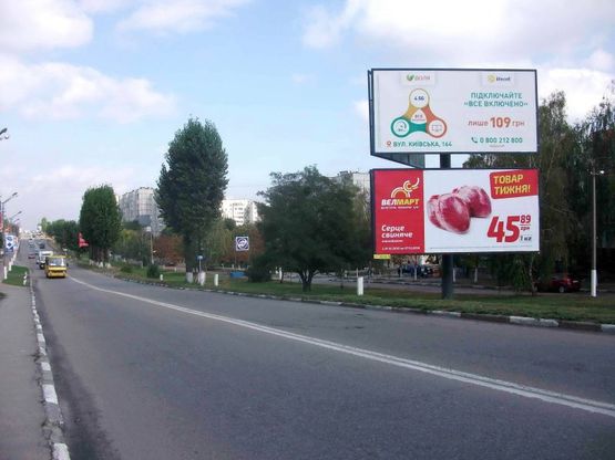 Фото рекламної площини за адресою м. Обухів, вул.Київська, 148,  навпроти ТЦ Магніт Фото рекламної площини за адресою м. Обухів, вул.Київська, 148,  навпроти ТЦ Магніт