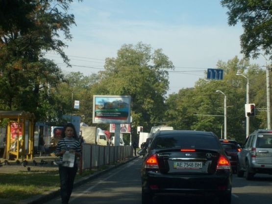 Фото рекламной плоскости по адресу 042А7,просп. Пушкіна, 21 - просп. О. Поля (Кірова), біля світлофора на зупинці Фото рекламной плоскости по адресу 042А7,просп. Пушкіна, 21 - просп. О. Поля (Кірова), біля світлофора на зупинці
