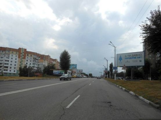 Фото рекламной плоскости по адресу м. Обухів, вул..Київська, 117, перед поворотом до супермаркета "Велмарт" Фото рекламной плоскости по адресу м. Обухів, вул..Київська, 117, перед поворотом до супермаркета "Велмарт"