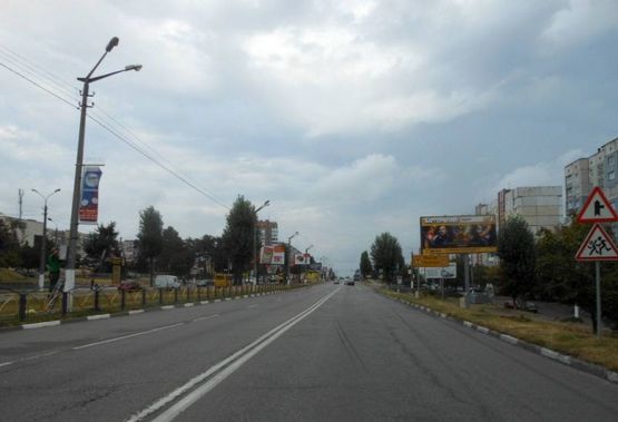 Фото рекламной плоскости по адресу м. Обухів, вул. Київська,158,  перед  світлофором Фото рекламной плоскости по адресу м. Обухів, вул. Київська,158,  перед  світлофором