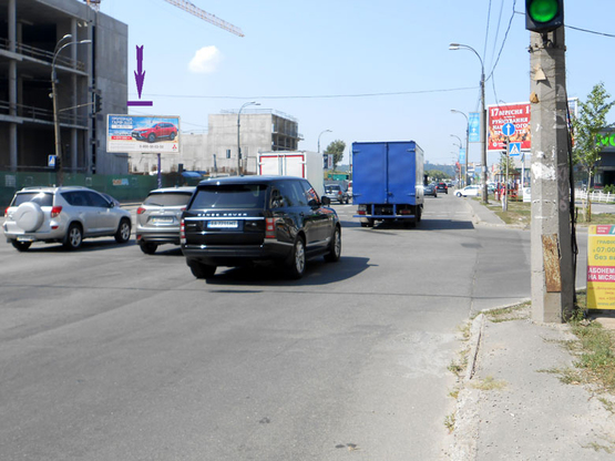 Фото рекламної площини за адресою Днепровская Набережная, напротив суп-та "Новус", на светофоре Фото рекламної площини за адресою Днепровская Набережная, напротив суп-та "Новус", на светофоре