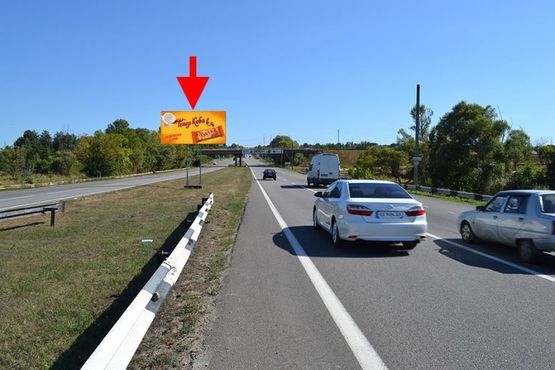 Фото рекламной плоскости по адресу Московский пр-т - Ростовская трасса -пос. Рогань-1-выезд из города