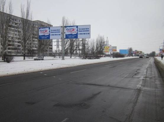 Фото рекламної площини за адресою Донецкое шоссе около маг. "Ясень" (правая плоскость).Р-н ж/м Левобережный-3 - по пути движения к ТЦ Караван, Березинскому рынку, А2 Фото рекламної площини за адресою Донецкое шоссе около маг. "Ясень" (правая плоскость).Р-н ж/м Левобережный-3 - по пути движения к ТЦ Караван, Березинскому рынку, А2