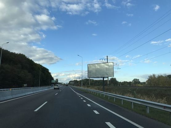 Фото рекламной плоскости по адресу Новообухівська траса (4 до Києва в напрямку центра)