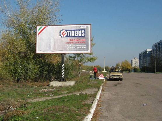 Фото рекламної площини за адресою пр-т К.Маркса, поворот на пр. Победы