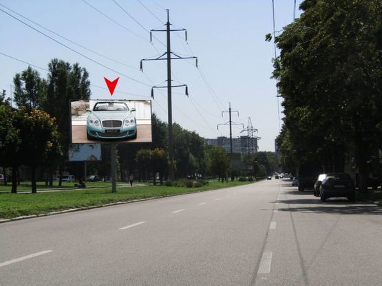 Фото рекламної площини за адресою Александра Поля пр-т, 96. Направление движения транспорта вверх, к ул.Титова Фото рекламної площини за адресою Александра Поля пр-т, 96. Направление движения транспорта вверх, к ул.Титова