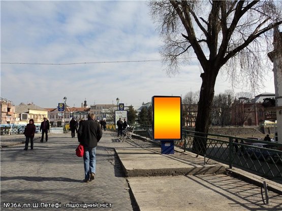 Фото рекламной плоскости по адресу пл.Ш.Петефі(вихід на пішох.міст), піш.зона, напр-пл.Театральна