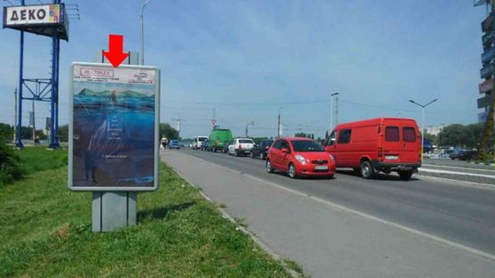Фото рекламної площини за адресою Рыбалка М. ул., 2а, возле ТРЦ"Оазис", №2
