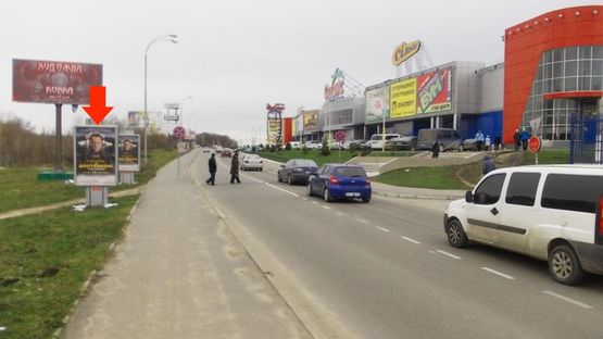 Фото рекламної площини за адресою Рыбалка М. ул., 2а, возле ТРЦ"Оазис", №9