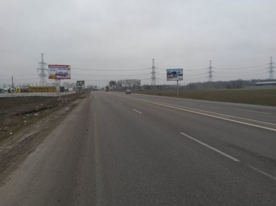 Фото рекламной плоскости по адресу Обьездная дорога 20+900 Б (перед клев. мостом от 2 столбов)