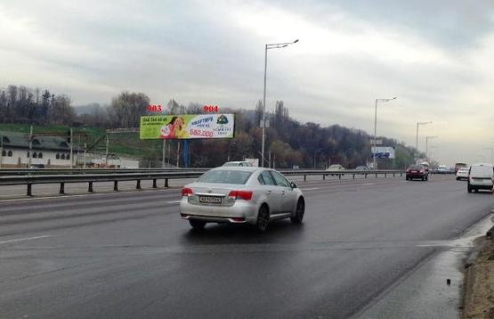 Фото рекламной плоскости по адресу Надднепрянское шоссе 200м. от Железнодорожного шоссе, после Южного моста, направление к мосту Патона, правая сторона