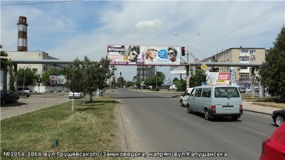 Фото рекламної площини за адресою вул.Грушевського,8-Заньковецької(арка)правий,напрям-вул.Капушанська