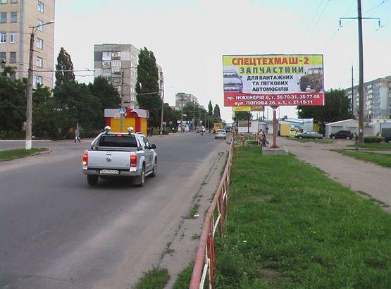 Фото рекламной плоскости по адресу ул. Попова, супермаркет АТБ Фото рекламной плоскости по адресу ул. Попова, супермаркет АТБ