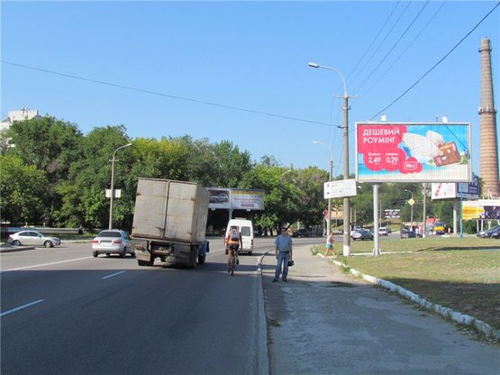 Фото рекламной плоскости по адресу ул. Космическая / АТБ призма Фото рекламной плоскости по адресу ул. Космическая / АТБ призма