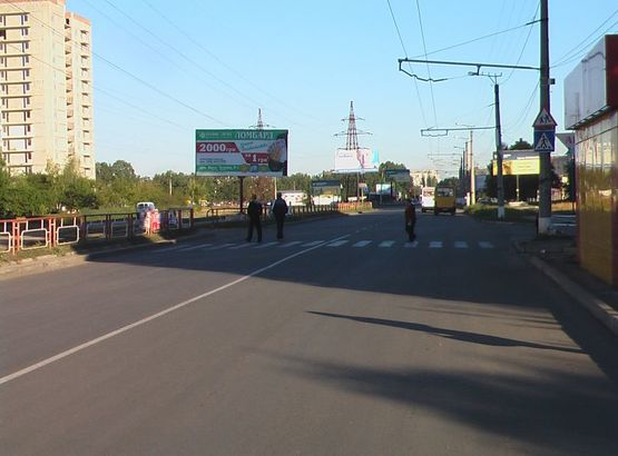 Фото рекламной плоскости по адресу ул. Попова, супермаркет АТБ Фото рекламной плоскости по адресу ул. Попова, супермаркет АТБ