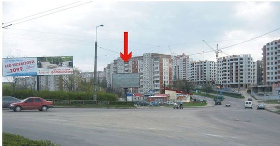 Фото рекламной плоскости по адресу вул. Коновальця біля кільця