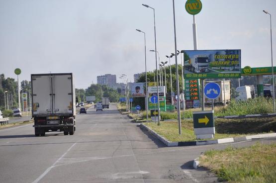 Фото рекламной плоскости по адресу Донецьке шосе, між АЗС WOG та АЗС ОККО