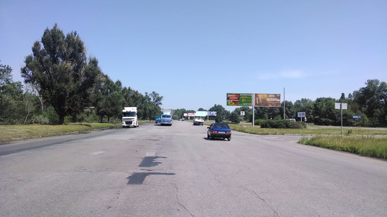Фото рекламной плоскости по адресу вул. М. Малиновського, поворот до Придніпровську, розподільник, з центру, правий