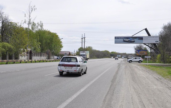 Фото рекламной плоскости по адресу Запорізьке шосе, виїзд з міста, селище Дослідне, напрям до с. Новоолександрівки, с. Братського