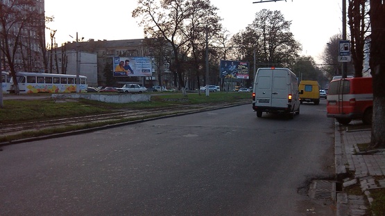 Фото рекламной плоскости по адресу пр-т Пушкіна, 55, навпроти Приватбанка