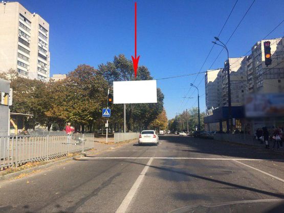 Фото рекламної площини за адресою s065A,вул. Робоча, 73, біля маг. ВАРУС, на світлофорі