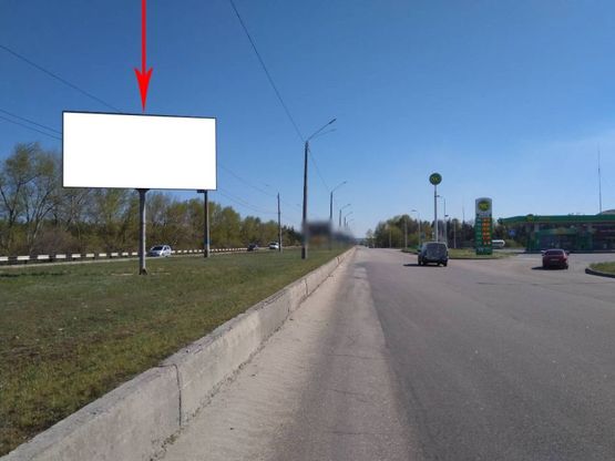 Фото рекламной плоскости по адресу дз16А1,Мостовий перехід через Дніпро, зїзд, біля АЗС "WOG", рух з лівого на правий берег