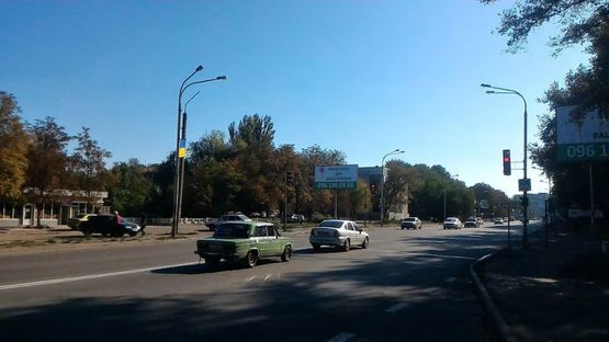 Фото рекламної площини за адресою Пв16Б,вул. Дніпровська, в районі буд. №551, біля світлофора